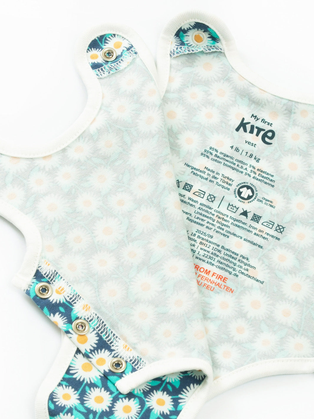 Open view of My First Vest Daisy Fields Navy showing easy access design – practical preemie baby clothing for premature and early baby arrivals