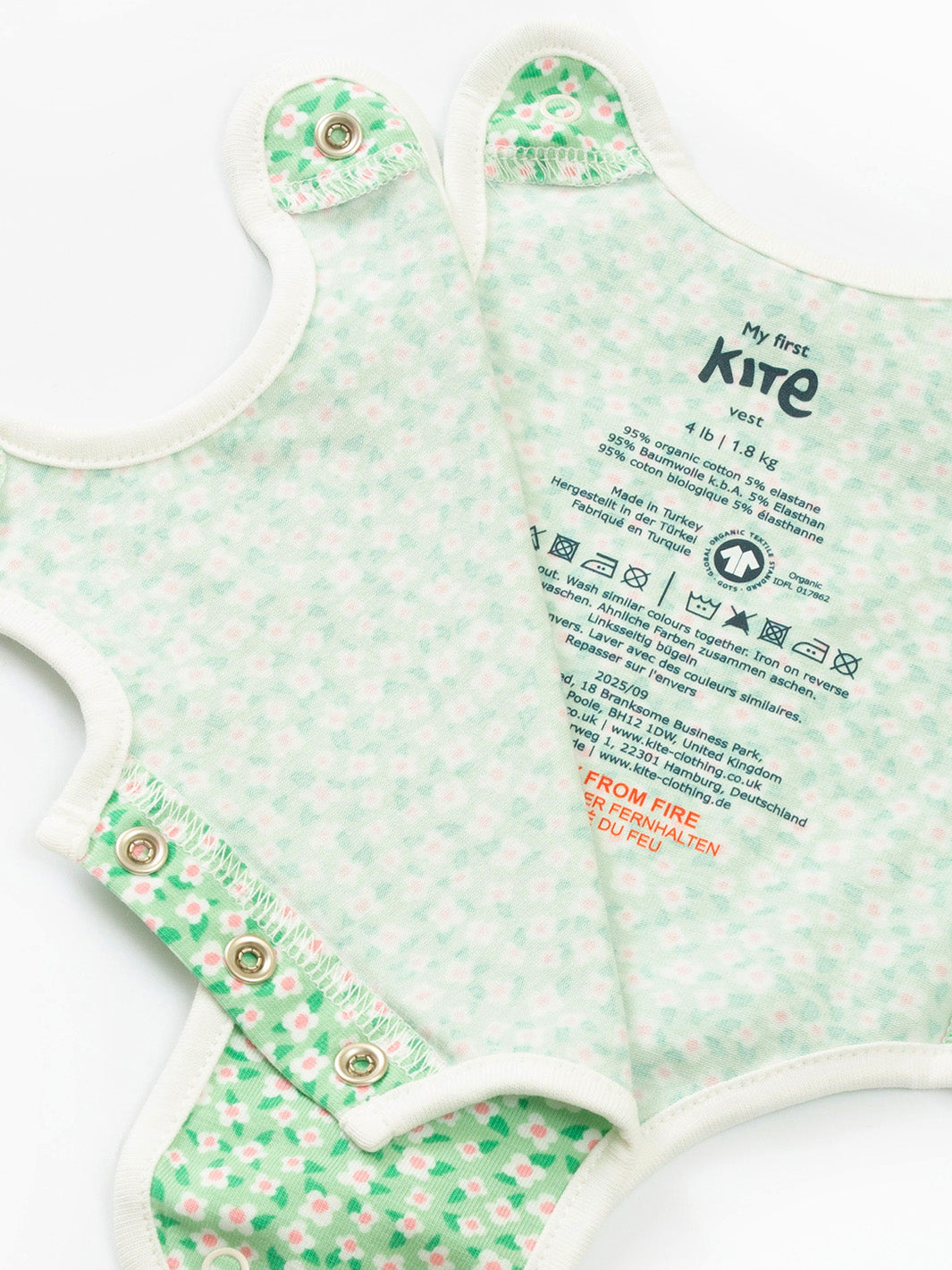 Open arm view of My First Vest Woodland Walk Green showing easy access design – ideal for premature and early babies