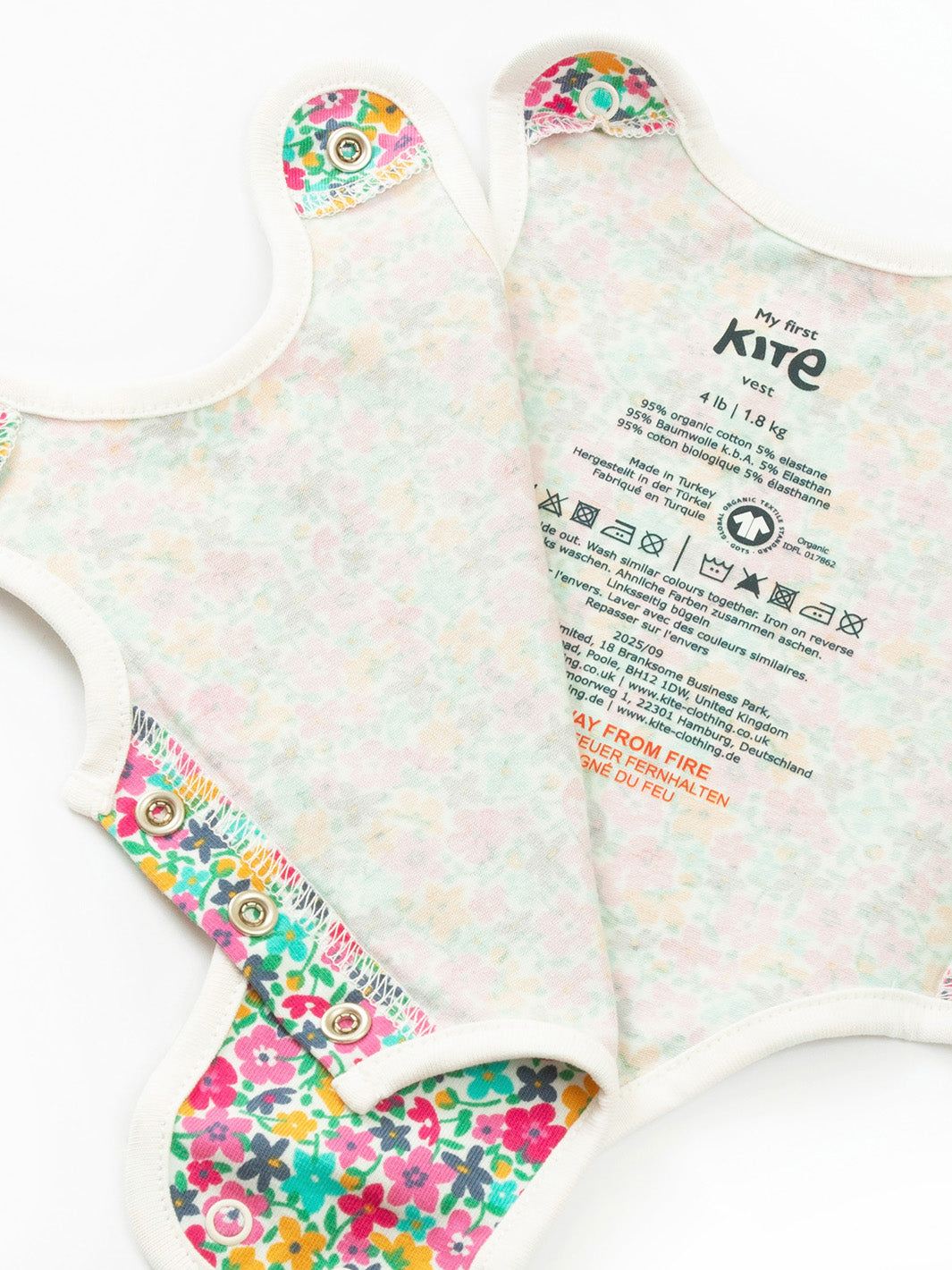 Open arm view of My First Vest Petal Potion Multi – easy access design for premature and early baby dressing