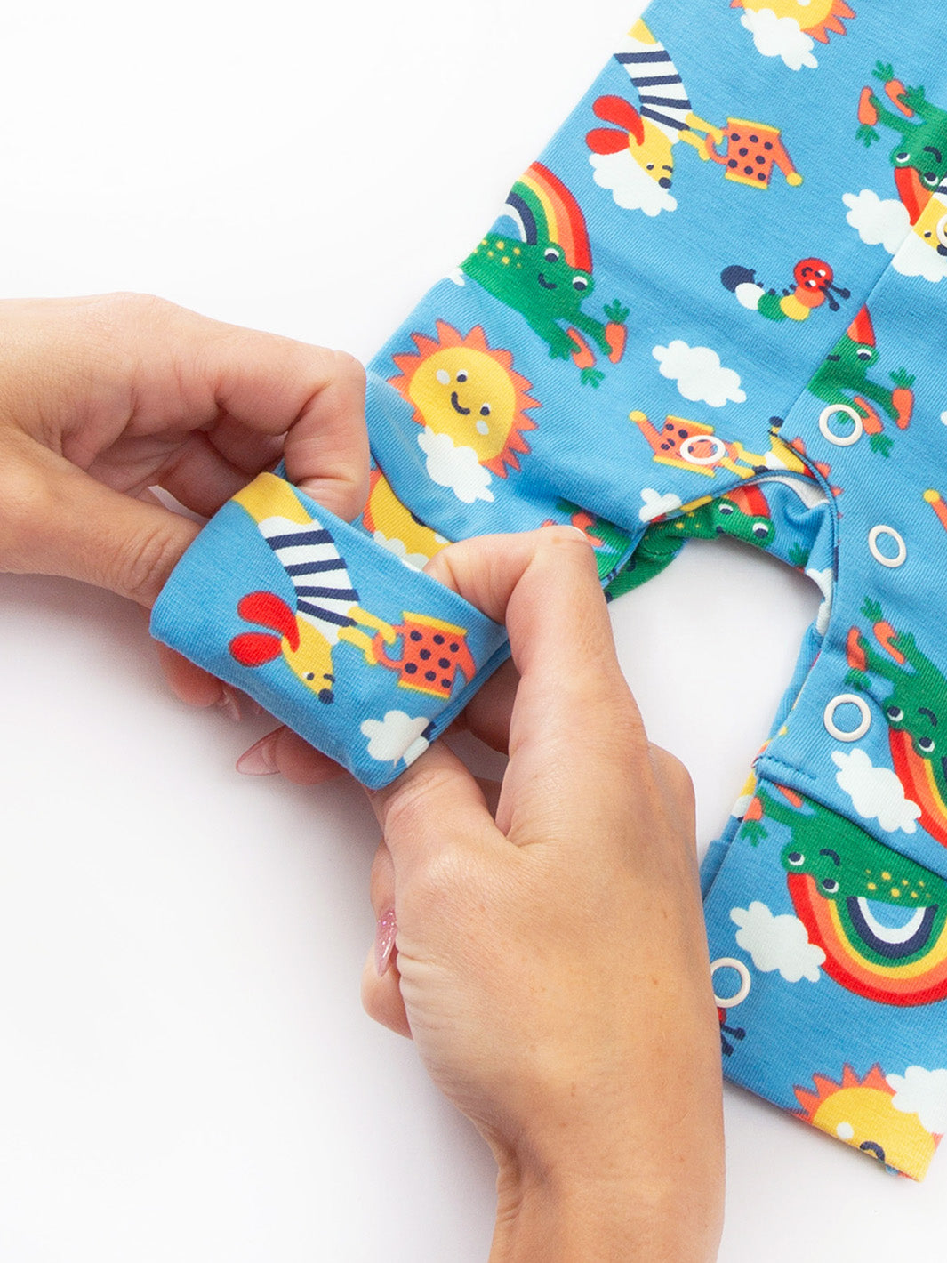 Detail of leg cuff on My First Sleepsuit Planet Pals Blue – gentle fit for tiny and premature babies.