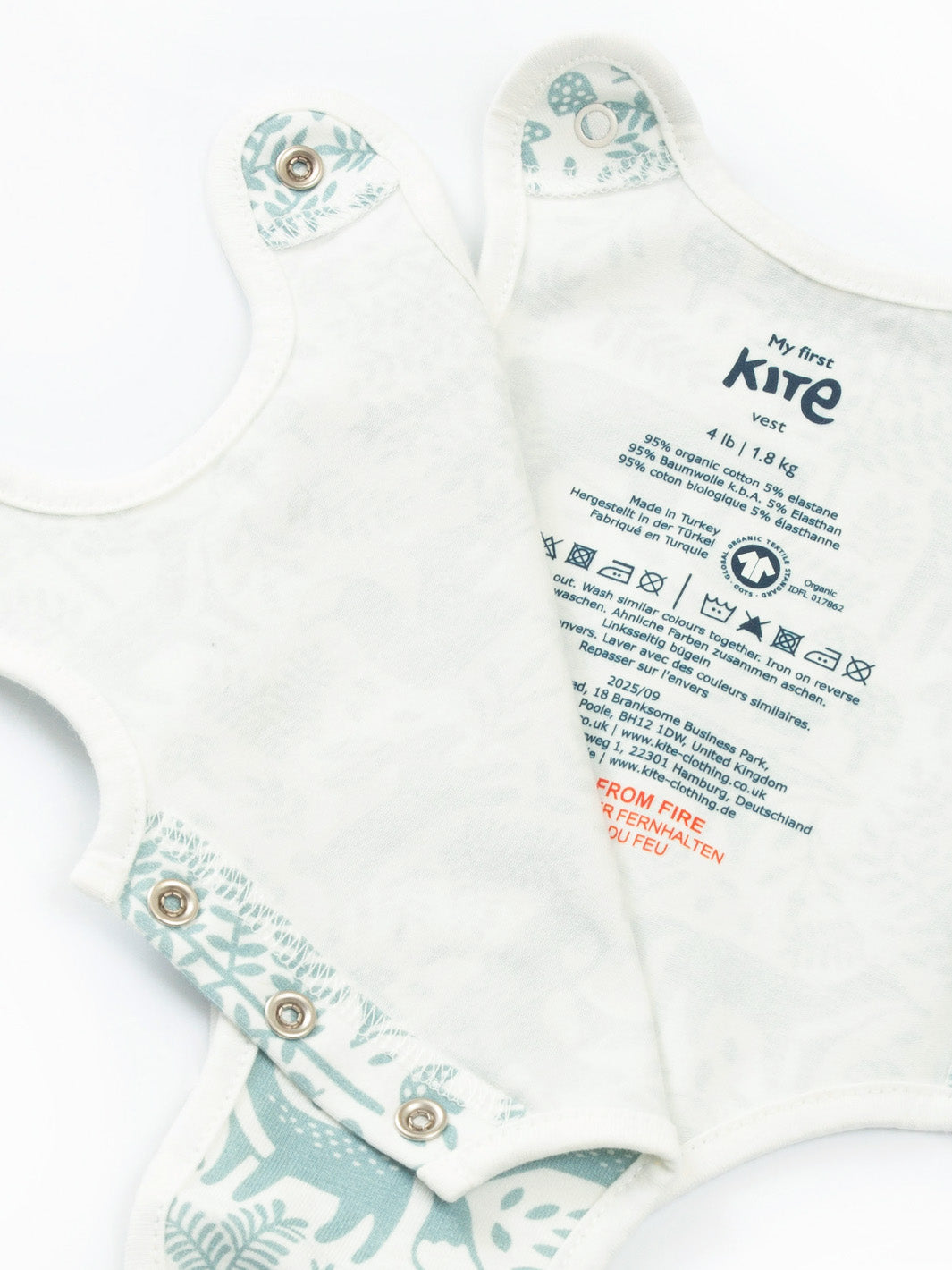Open arm view of My First Vest Woodland Walk Green showing easy access design – ideal for premature and early baby dressings